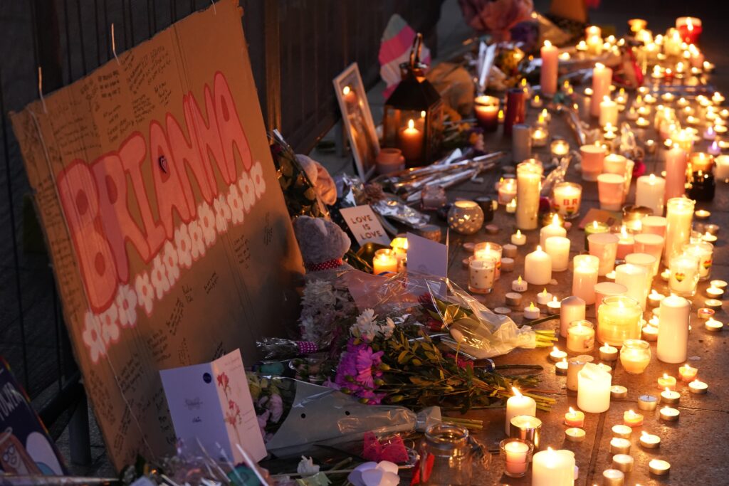 Flowers and candles left during a candle-lit vigil at Old Market Place in Warrington, in memory of transgender teenager Brianna Ghey, who was fatally stabbed in a park last Saturday. 