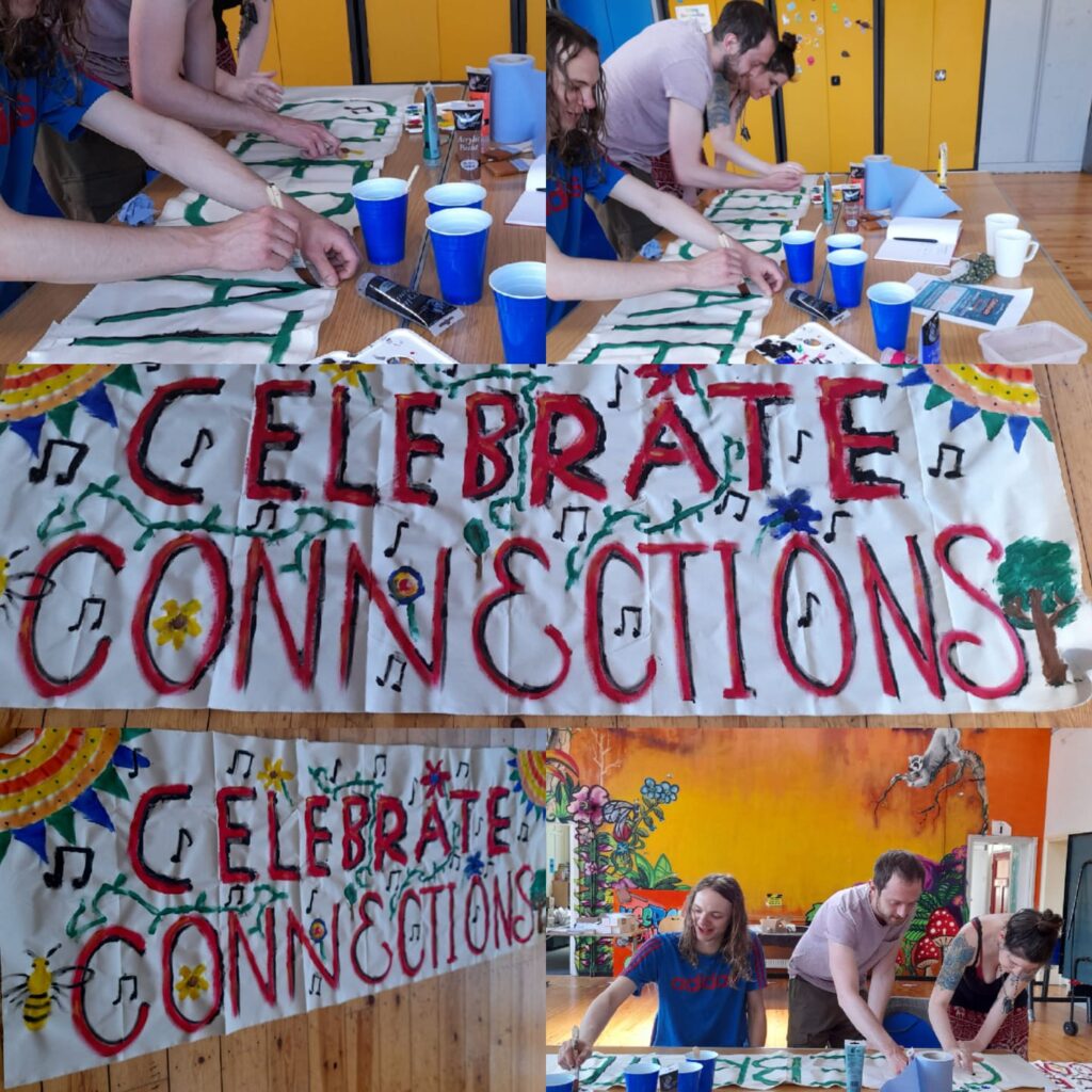 People making the Celebrate Connections pop-up music banners at a workshop